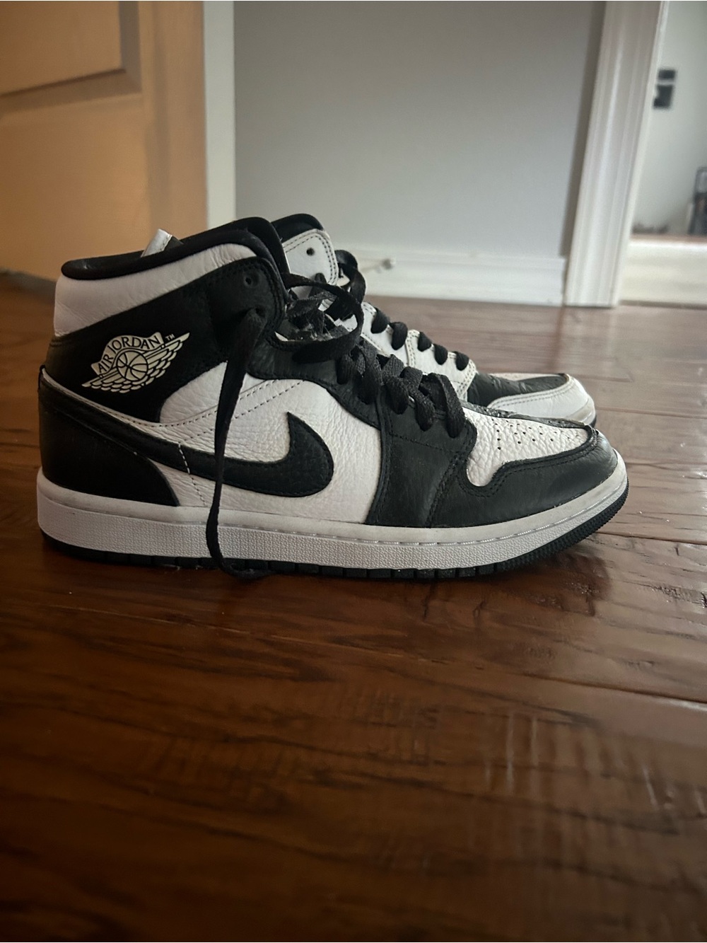 Nike Women’s Black and White High-Top Sneakers